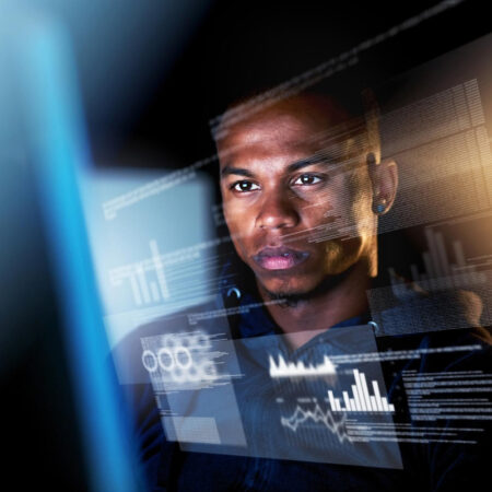 A professional analyzing digital data overlays on a transparent screen, illustrating the challenge of managing fragmented information for accurate verification.