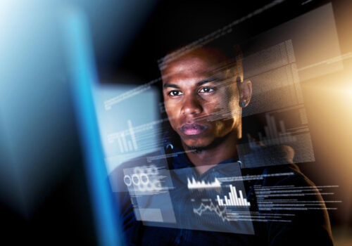 A professional analyzing digital data overlays on a transparent screen, illustrating the challenge of managing fragmented information for accurate verification.