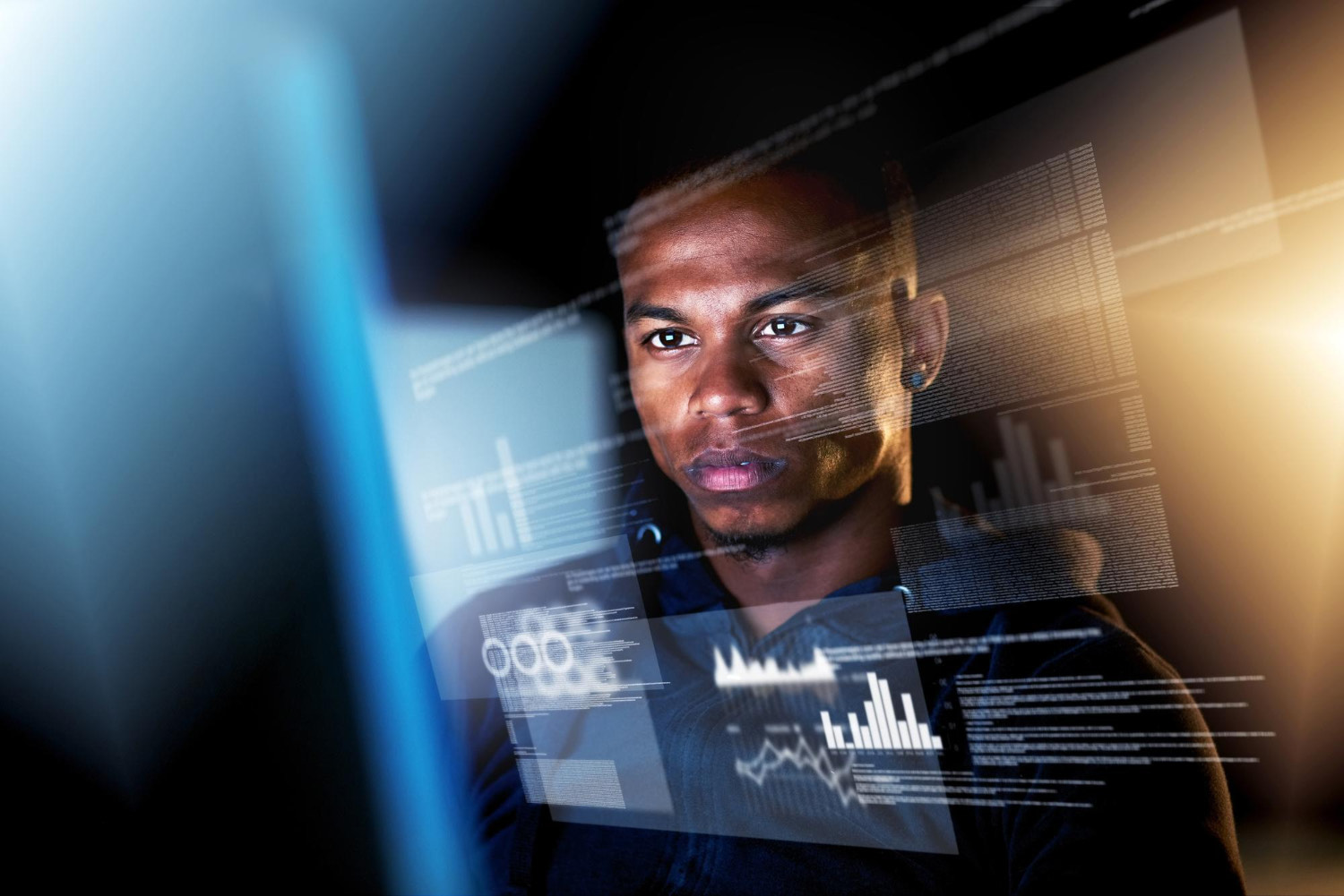 A professional analyzing digital data overlays on a transparent screen, illustrating the challenge of managing fragmented information for accurate verification.