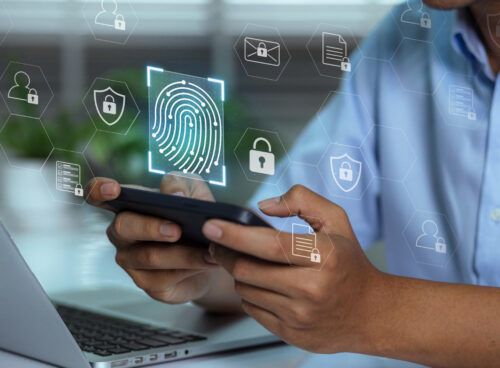 Hands holding a smartphone with digital lock and verification icons representing an age verification system